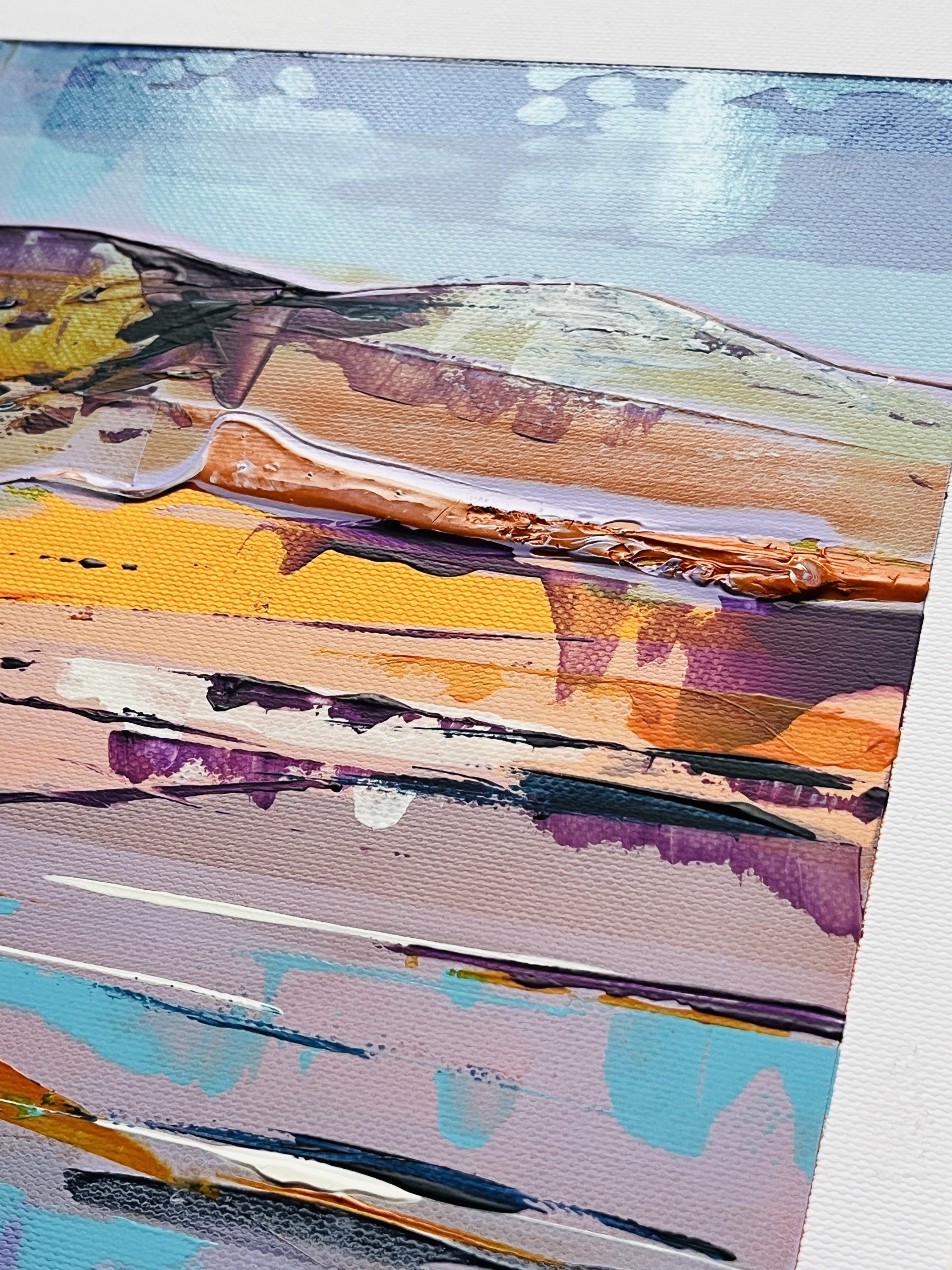 Abstract landscape painting with layered horizontal brushstrokes in blue, purple, orange, yellow, beige, and gray tones.