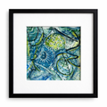 Framed abstract artwork with blue and green colors on a white background